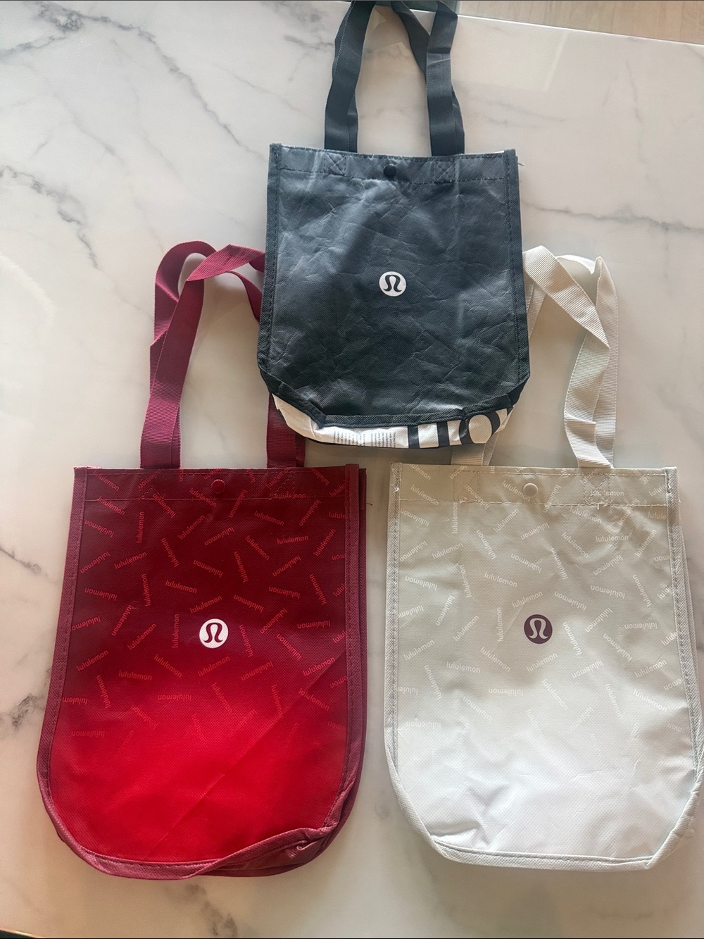 lululemon athletica Tote Trio in Black, Red, and Light Gray